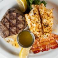 Petite Frank’S Surf & Turf Classic · An 8 oz. Brazilian lobster tail paired with a 8 oz. filet mignon served with drawn butter.