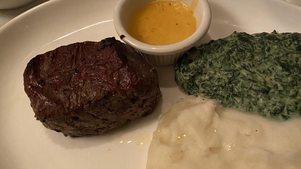 Filet Mignon · A 12 oz. filet served with your choice of béarnaise sauce, bordelaise sauce or au poirve sauce.