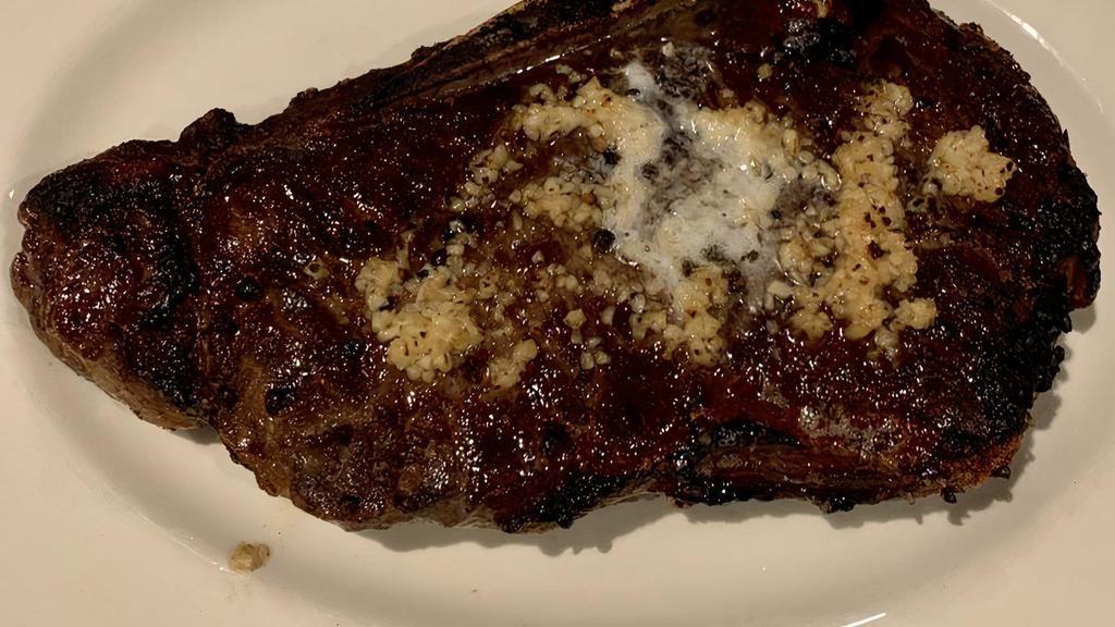 New York Prime Strip Steak (16 Oz) · USDA prime aged New York strip steak grilled to your desired temperature.