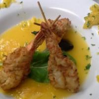 Coconut Shrimp · Served with Key West Lime and Mango Glaze.