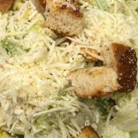 Chicken Cesar Salad · With Grilled Chicken, Croutons and Parmesan.