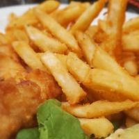Beer Battered Fish And Chips · Served with Tartar Sauce and Lemon