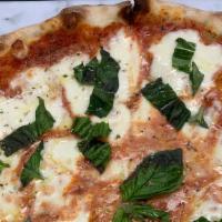 Margherita Pizza · Mozzarella, tomato and basil