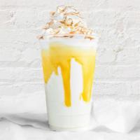 Coquito Shake · Creamy coconut ice cream blended with  a scoop of rum raisin  ice cream with caramel drizzle...