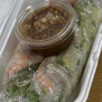Traditional Summer Rolls /Goi Cuon Tom Thit · Boiled shrimps, slices of pork, vermicelli, mint leaves, lettuce chive wrapped
in Vietnamese...