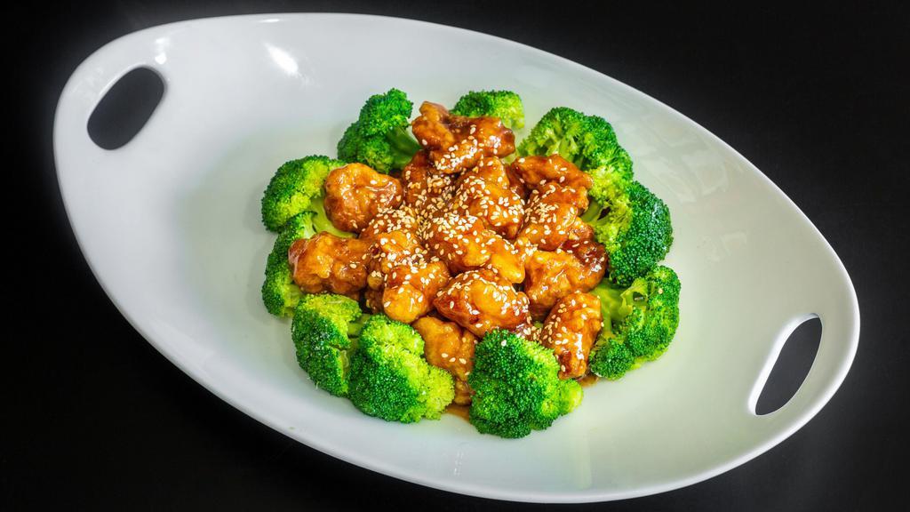 Sesame Chicken · Served with pork fried rice, brown rice, or white rice.