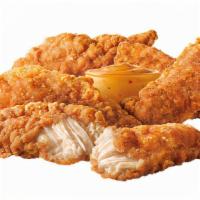 Crispy Chicken Tenders · Crispy-on-the-outside, juicy-on-the-inside, these all-white meat chicken tenders are packed ...