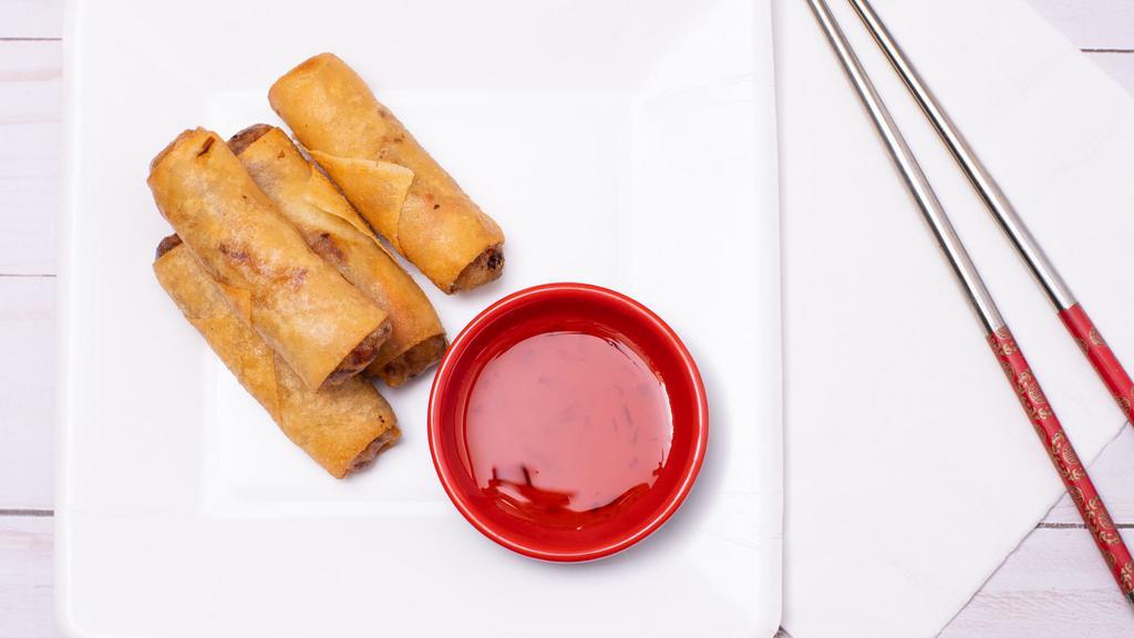 Duck Spring Rolls (4) · Deep-fried egg roll skin stuffed with shredded duck, cabbage, glass noodle, carrot.