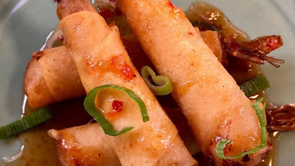 Shrimp Rolls 5 Pcs · Marinated shrimp wrapped with spring roll skin, served with sweet chili plum sauce.