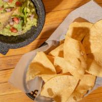 Guacamole And Chips · Warm homemade tortilla chips with guacamole.