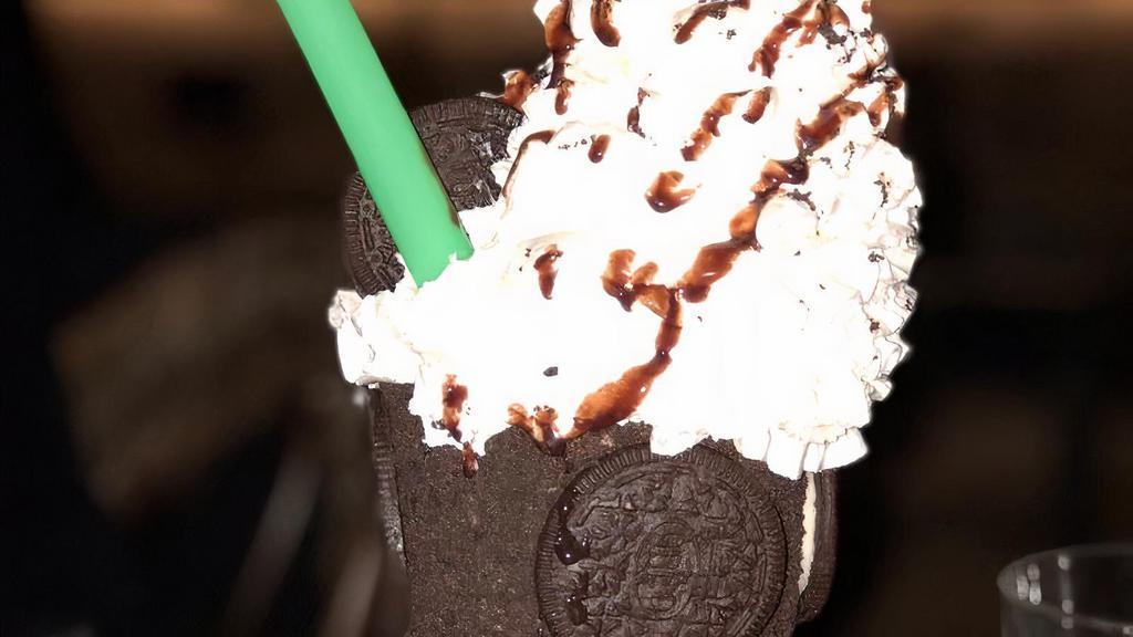 Black & White Shake · Vanilla ice cream, Oreo crumble, chocolate syrup, and Oreo rim, B&W cookies