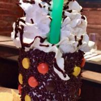 Peanut Butter Crunch Shake · Chocolate ice cream, Cap'n Crunch cereal, Reese's Pieces, and chocolate syrup.