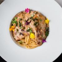 Veal Piccate · Veal cutlet, capers, lemon & demi-glace on a bed of spaghetti