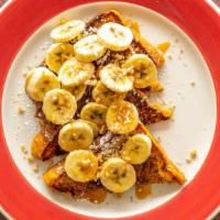Banana Caramel Crunch · Home style challah bread  French toast encrusted with walnuts and brown sugar then topped wi...