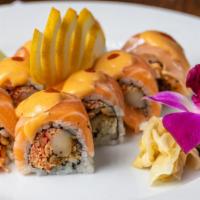Bad Boy Roll · Spicy crab and spicy white tuna inside, topped with salmon and spicy mayo.