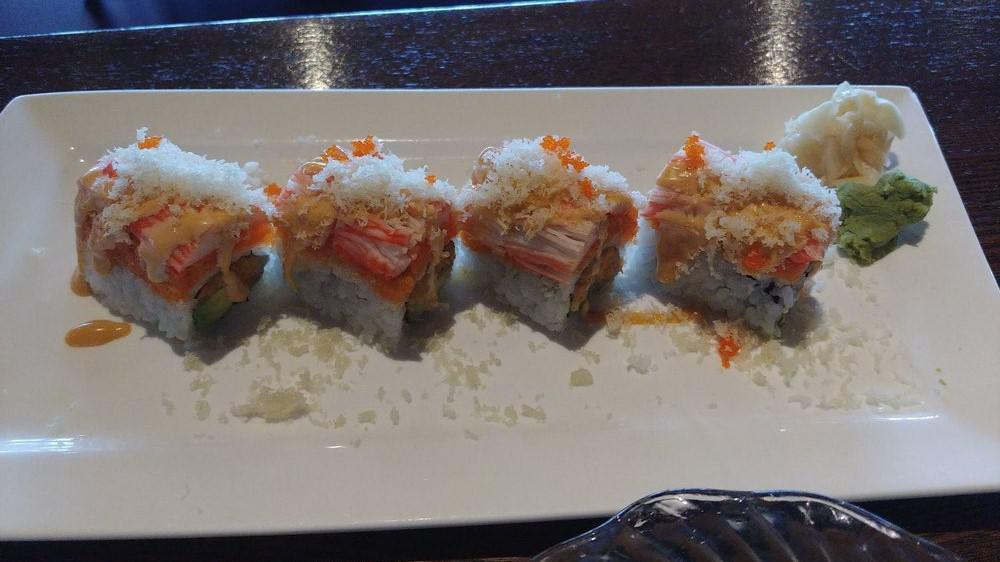 M16 Roll · Spicy crunchy yellowtail and avocado inside, topped with spicy salmon, crab and spicy mayo, crunch and caviar.