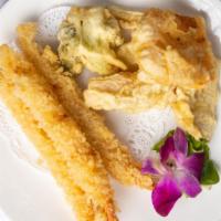 Shrimp Tempura · Classic deep-fried dish with light tempura, butter and sweet tempura sauce.