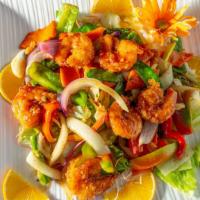 Thai Butterfly Shrimp · Jumbo shrimp stir fried with Asparagus, onion, carrot, snow peas & bell pepper