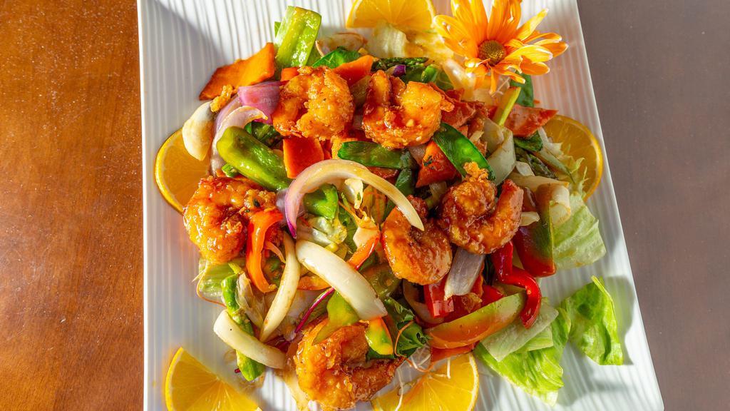Thai Butterfly Shrimp · Jumbo shrimp stir fried with Asparagus, onion, carrot, snow peas & bell pepper