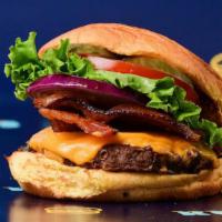 Bacon Cheese Kudos Burger · 100% juicy Angus beef grilled to perfection with melted over American. Served on a toasted b...