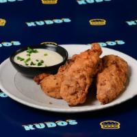 Chicken Tenders · Classic buttermilk battered chicken tenderloins, fried until crispy, served with your choice...