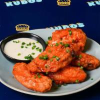 Chicken Wings · 5 delicious vodka battered chicken wings, fried until ultra crispy

From the moment you orde...