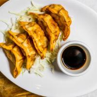 Pan Fried Dumplings · Choice of filling folded into fresh dumpling then pan-fried to perfection. Served with a bas...