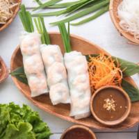 Summer Roll · Fresh salad wrapped in rice paper roll with a plum dipping sauce.