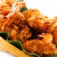 Butterfly Shrimp · Hearty prawns breaded and served with a sweet chili dipping sauce.