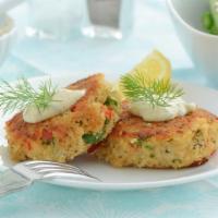 Thai Crab Cake · Hearty crab cake seasoned with traditional spices and served with a Thai sweet chili dipping...