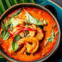 Red Curry · Hearty choice of meat served with peppers, bamboo shoots, pineapple, and Thai basil in a spi...