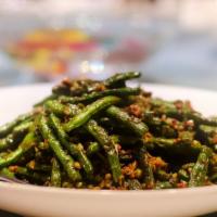 String Beans (Vegan) · Tender string beans sauteed with soybeans, fresh garlic, and bean curd and served with Jasmi...