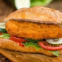 Chicken Cutlet Sandwich · Chicken Cutlet sandwich served with cheese, lettuce, and tomato.