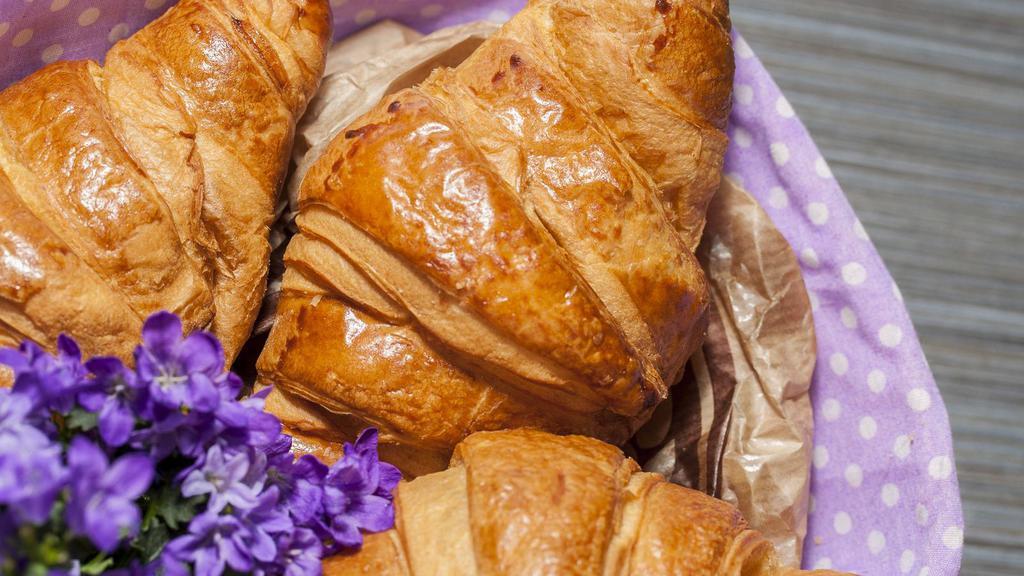 Croissant · Freshly baked Croissant with a flaky, buttery texture.