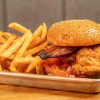 Fried Chicken Sandwich · candied bacon, lettuce, tomato, pickles, . Morgan's sauce on a toasted sesame brioche bun
