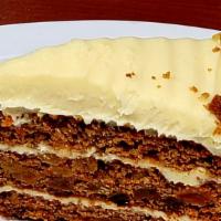 Carrot Cake Triple Layer  · All Natural. Carrot With Real Cream Cheese, Sliced Walnuts & Golden Raisins.