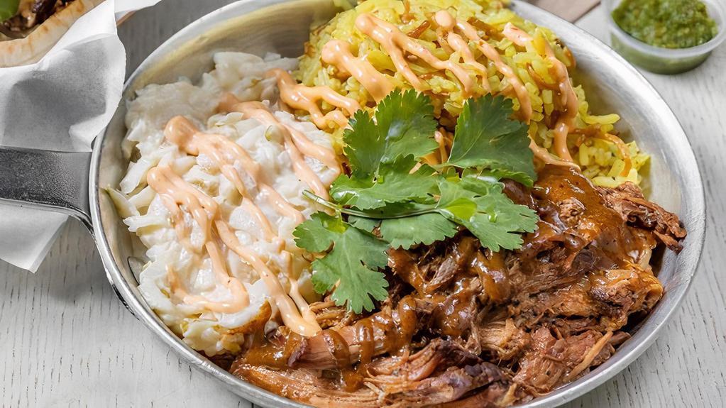 Pulled Pork (Pan) · Spice rubbed and slow roasted berkshire pork shoulder, Taboonette BBQ sauce, apple-jicama slaw, cilantro, chipotle aioli. Choice of yellow, vermicelli rice or brown rice.