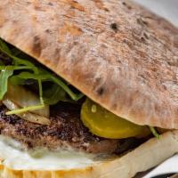 Taboonette Beef Burger (Pita) · (Nuts)Burger patty made of blended dry aged brisket & short ribs, charred onions, arugula-he...