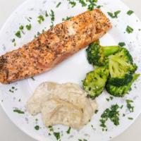 Grilled Salmon · Lemon and butter sauce.