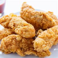 2 Chicken Strips · Golden, crispy, fried chicken strips.