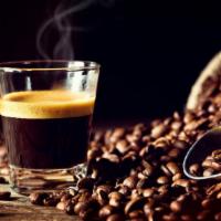 Colombian Medium Roast Coffee · Freshly brewed, hot 100% Colombian coffee.