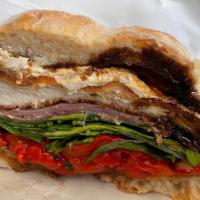 Paulie Jr. · Chicken cutlet, prosciutto, fresh mozzarella, roasted peppers, balsamic glaze, baby spinach.