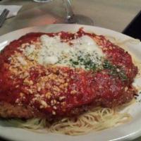 Veal Parmesan · Breaded veal cutlet topped with marinara sauce and melted mozzarella cheese. Served with you...