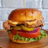 Organic Buttermilk Fried Chicken · Marinated in Buttermilk, Lettuce, Tomato, Red Onion, Sliced Kosher Pickles, House-made Chipo...