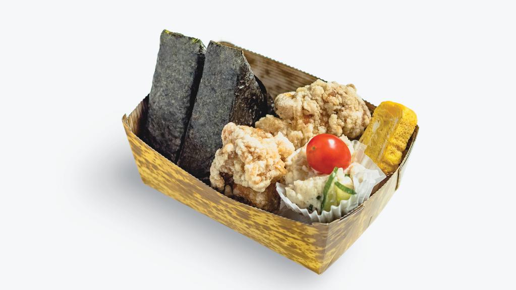 Kara-Age Onigiri Bento · 2 pc kara-age boneless thigh, served with 2 pc onigiri rice balls, egg omelette, and salad.