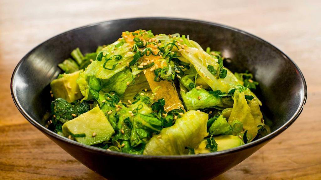 House Salad · Avocado and carrot ginger dressing.