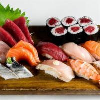 Sushi-Sashimi Combination · Chef’s choice of 9 pcs sashimi, 6 pcs sushi, and 1 roll.