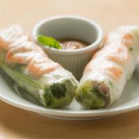 Summer Rolls · Two rolls of rice noodles pork and shrimp rolled in rice paper and served with a peanut sauce.