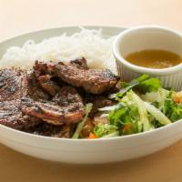 Grilled Angus Beef Short Ribs · A rolling spring roll favorite! Sliced short ribs that are marinated and then grilled.