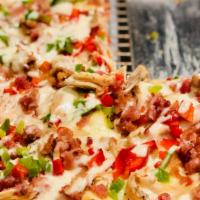Square Chicken Bacon Ranch Pizza · Mouthwatering 14 inch square Cheese Pizza, topped with fresh sautéed chicken and delicious b...